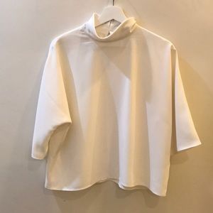 Uniqlo Cream Mock-neck blouse